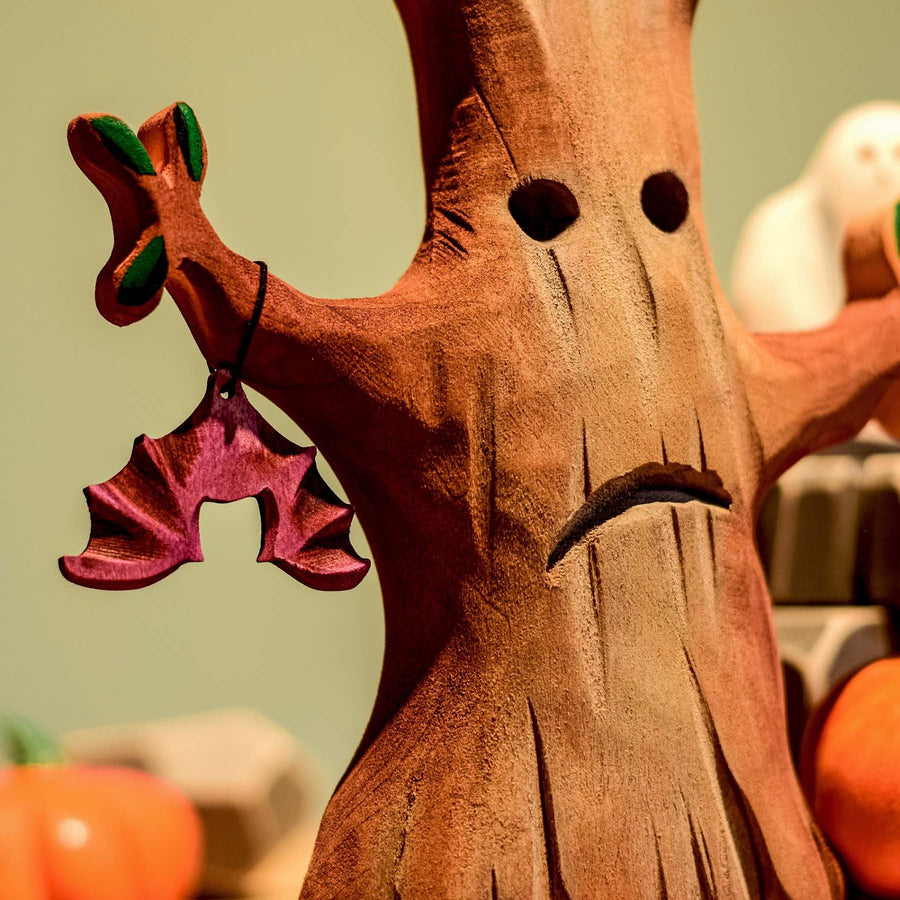 posed in a Halloween play scene along with other spooky Bumbu toys such as a ghost and pumpkins.