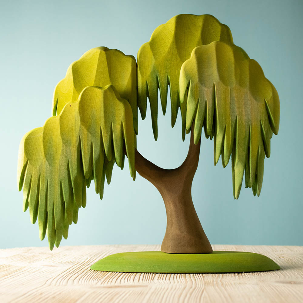 Bumbu children's plastic-free wooden Willow tree toy on a blue background