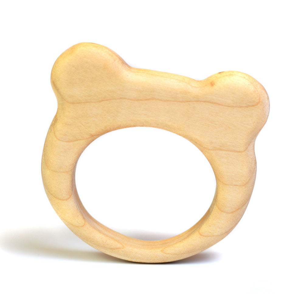 Bumbu hand carved wooden bear baby teething toy on a white background