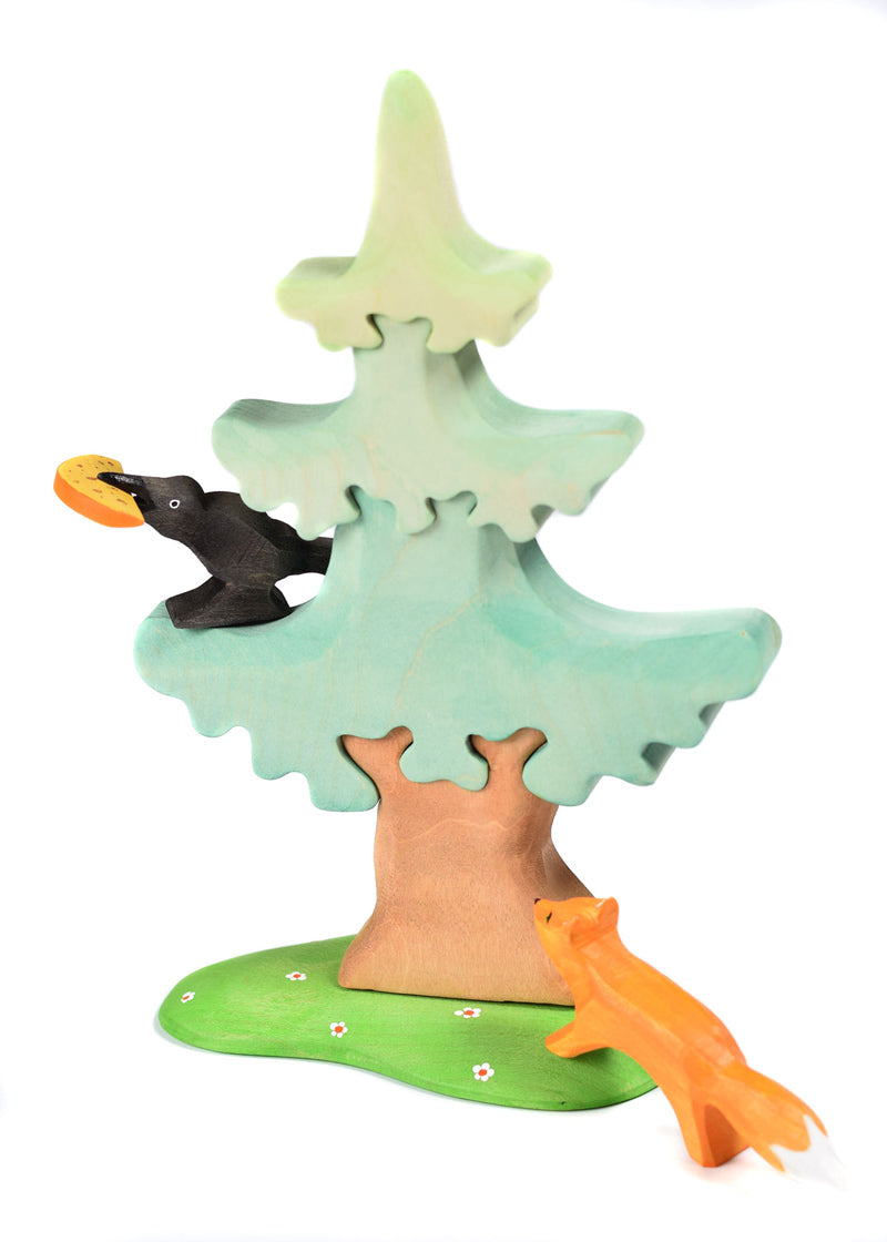 Bumbu raven and cheese toy in a wooden Bumbu tree on a white background