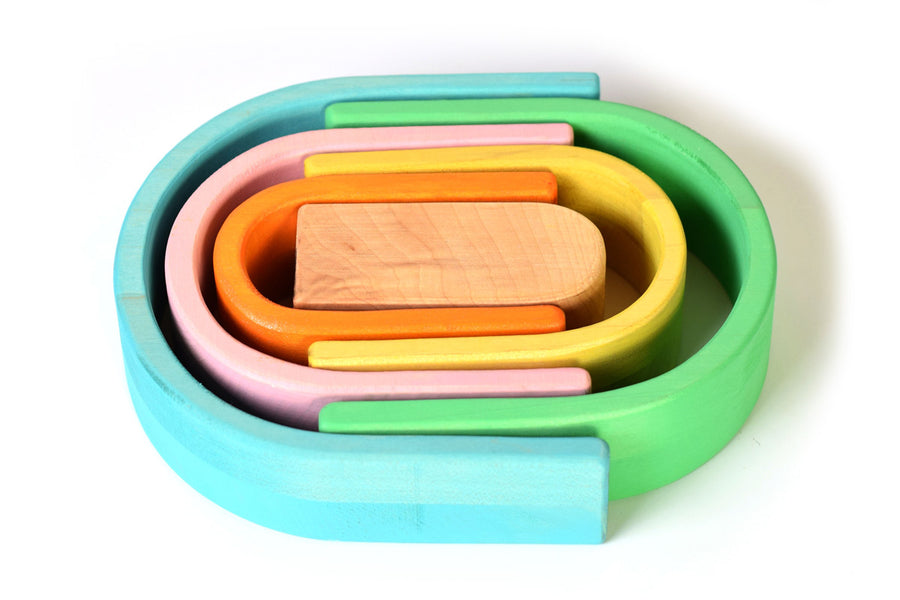 Bumbu plastic-free pastel arches laid out in an oval shape on a white background