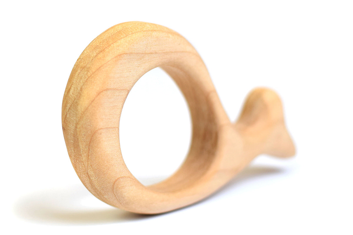 Bumbu handmade wooden whale baby teething toy on a white background