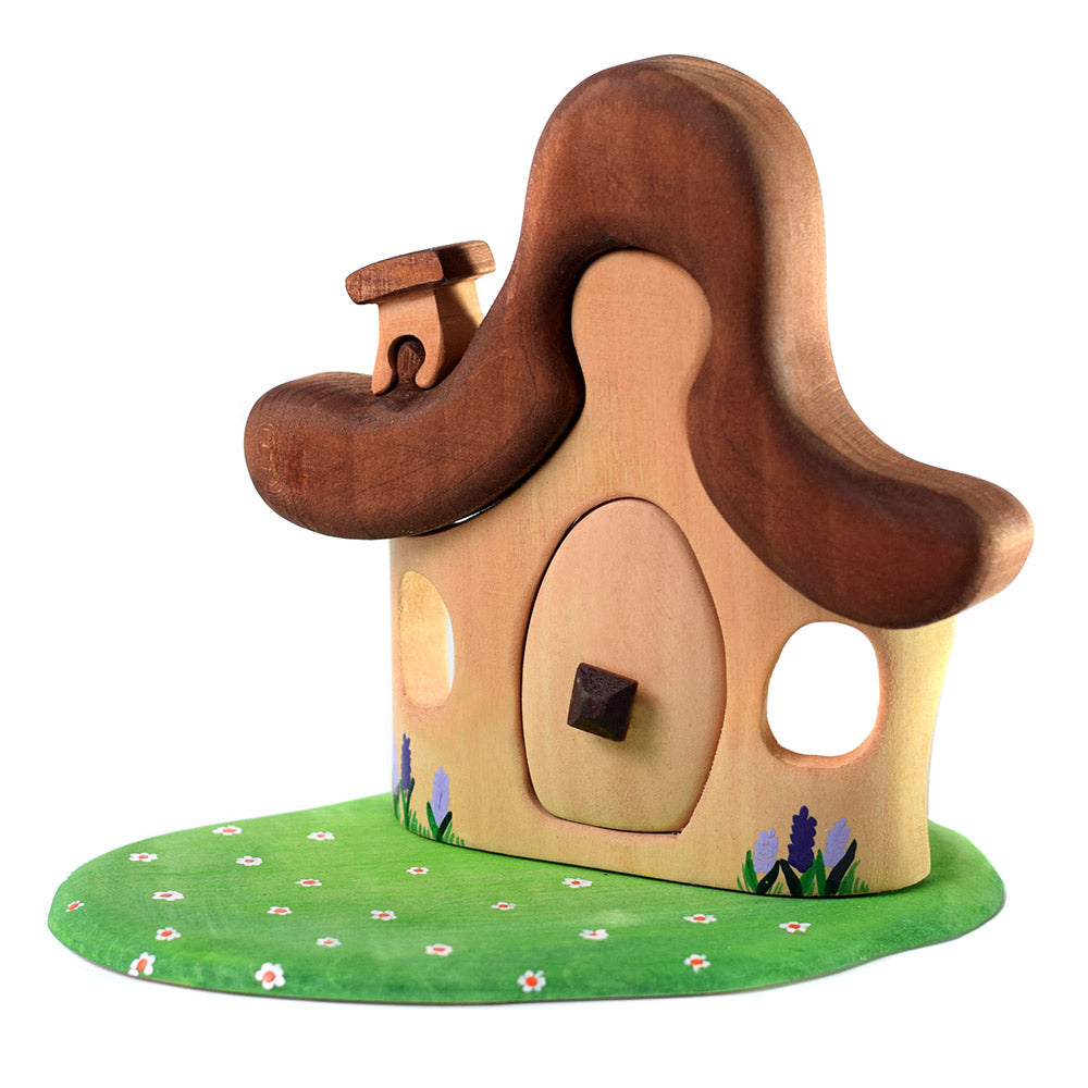 Bumbu handmade wooden hut in the forest toy on a white background