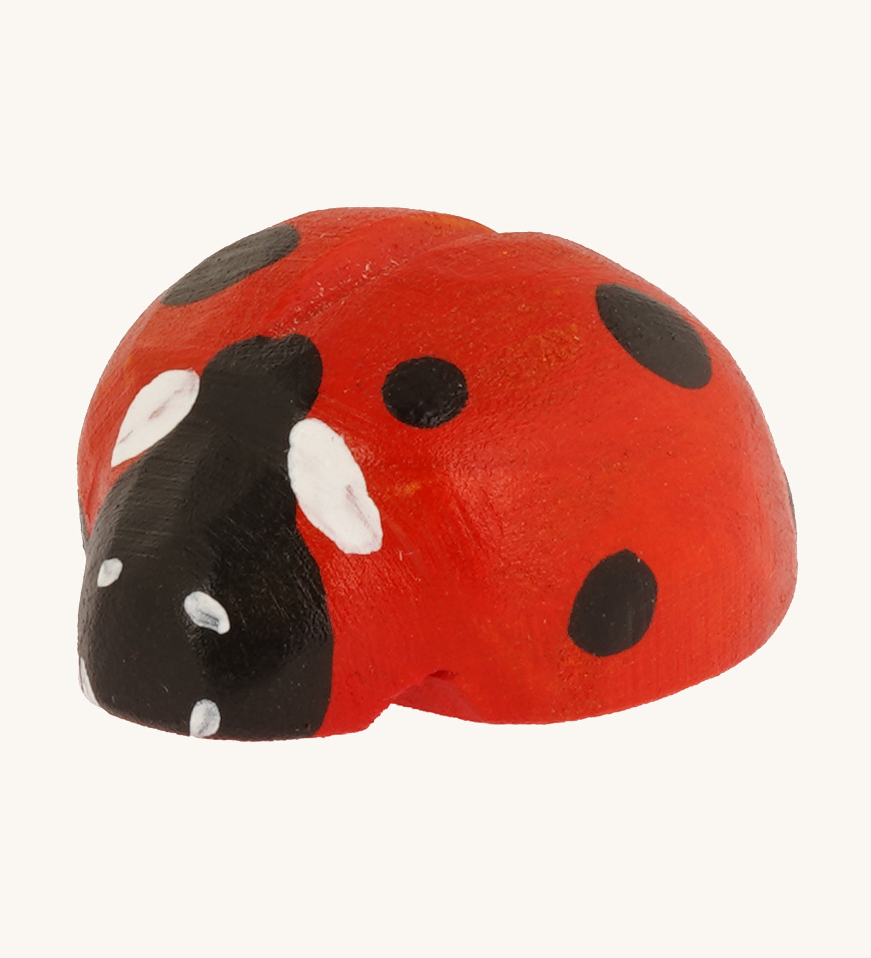 Bumbu Wooden Ladybird pictured on a cream background