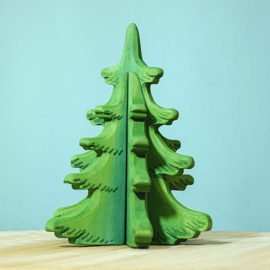 Bumbu Large Green Sugar Pine Tree pictured on a blue background