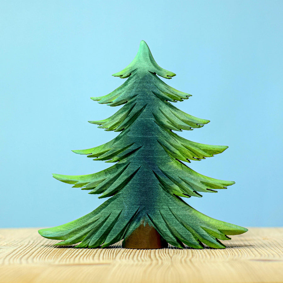 Bumbu Large Wooden Handmade Fir Tree in various shades of green