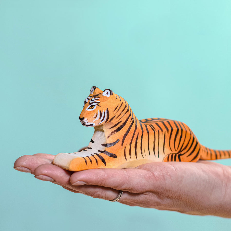 Bumbu Wooden Lying Tiger in a person's hand