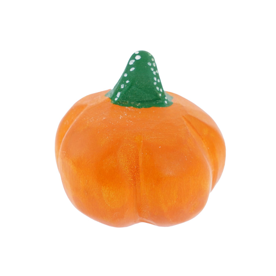 Bumbu hand carved medium wooden pumpkin toy on a white background