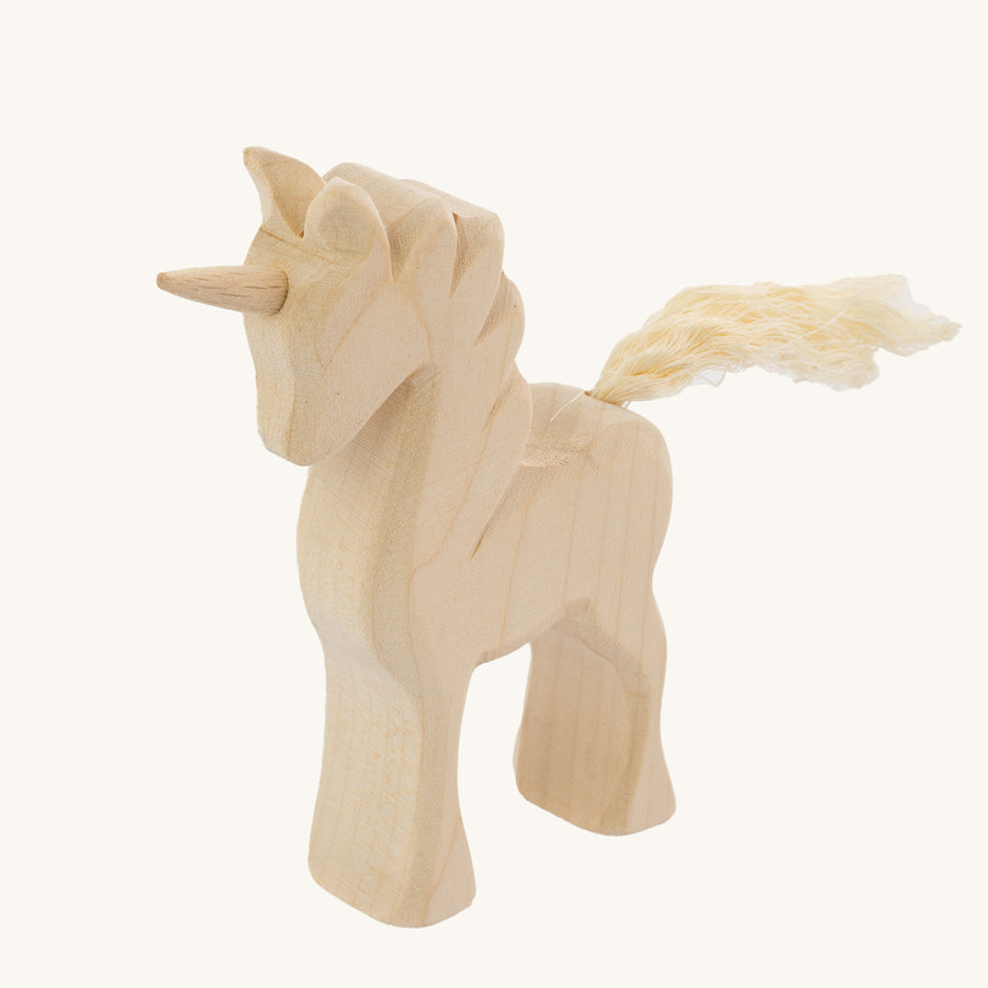 Bumbu Natural Wood Unicorn on a plain background.