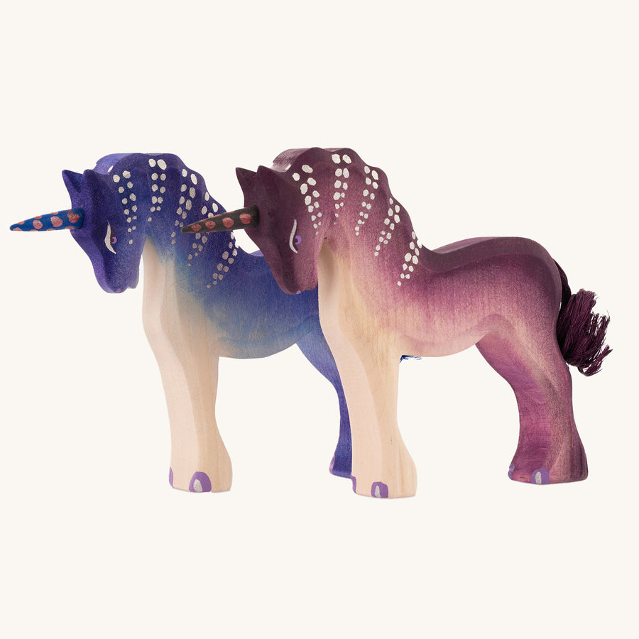 Bumbu Pink and Blue Unicorn on a plain background