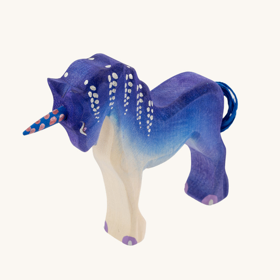 Bumbu Purple Unicorn on a plain background.