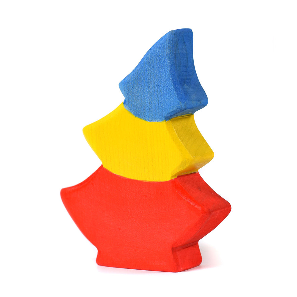 Bumbu hand carved wooden tree toy in the Romanian flag colours on a white background