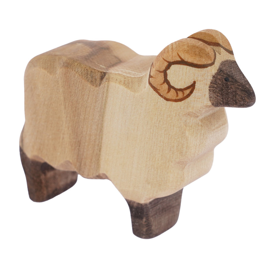 Bumbu handmade wooden aries ram standing on a white background