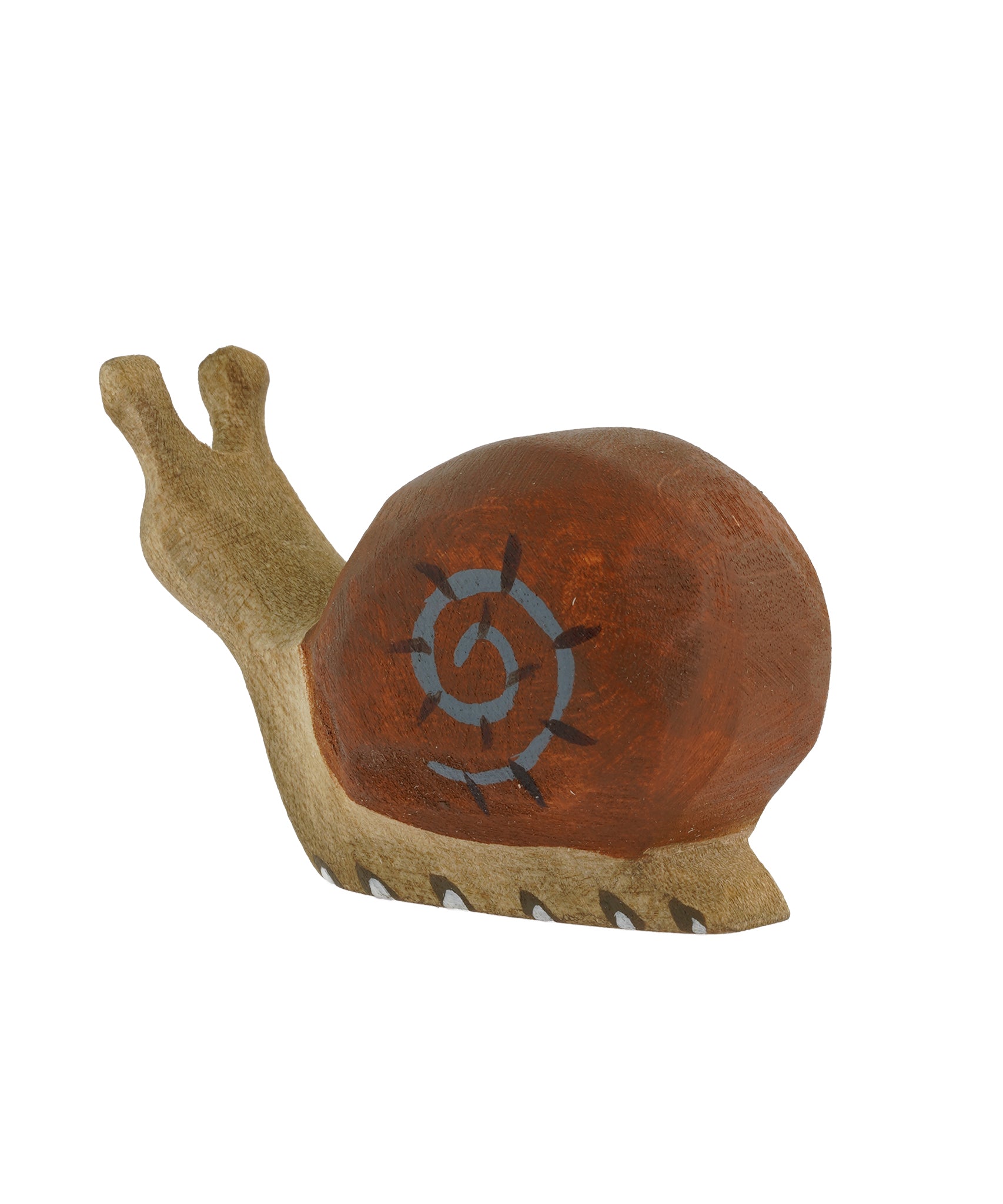 The Bumbu wooden snail figure seen in an adult's hand 