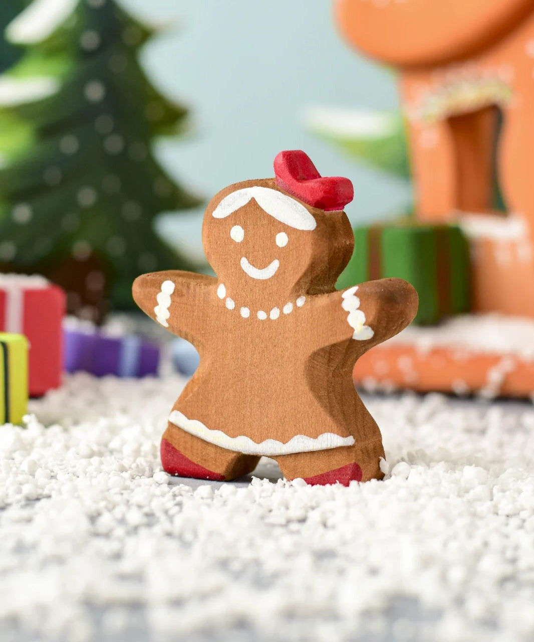 A Christmas scene including the Bumbu wooden gingerbread cookie girl