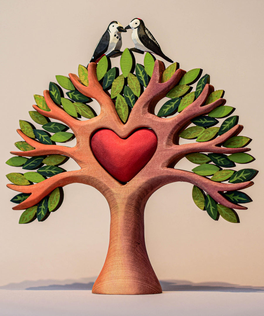 Bumbu Wooden Heart Tree. A beautifully crafted Wooden Tree with light brown branches with two Bumbu woodpecker figures sitting on top. 