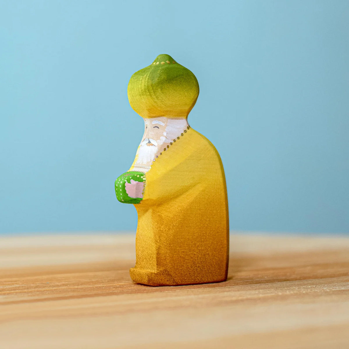 on a wooden surface with a blue background