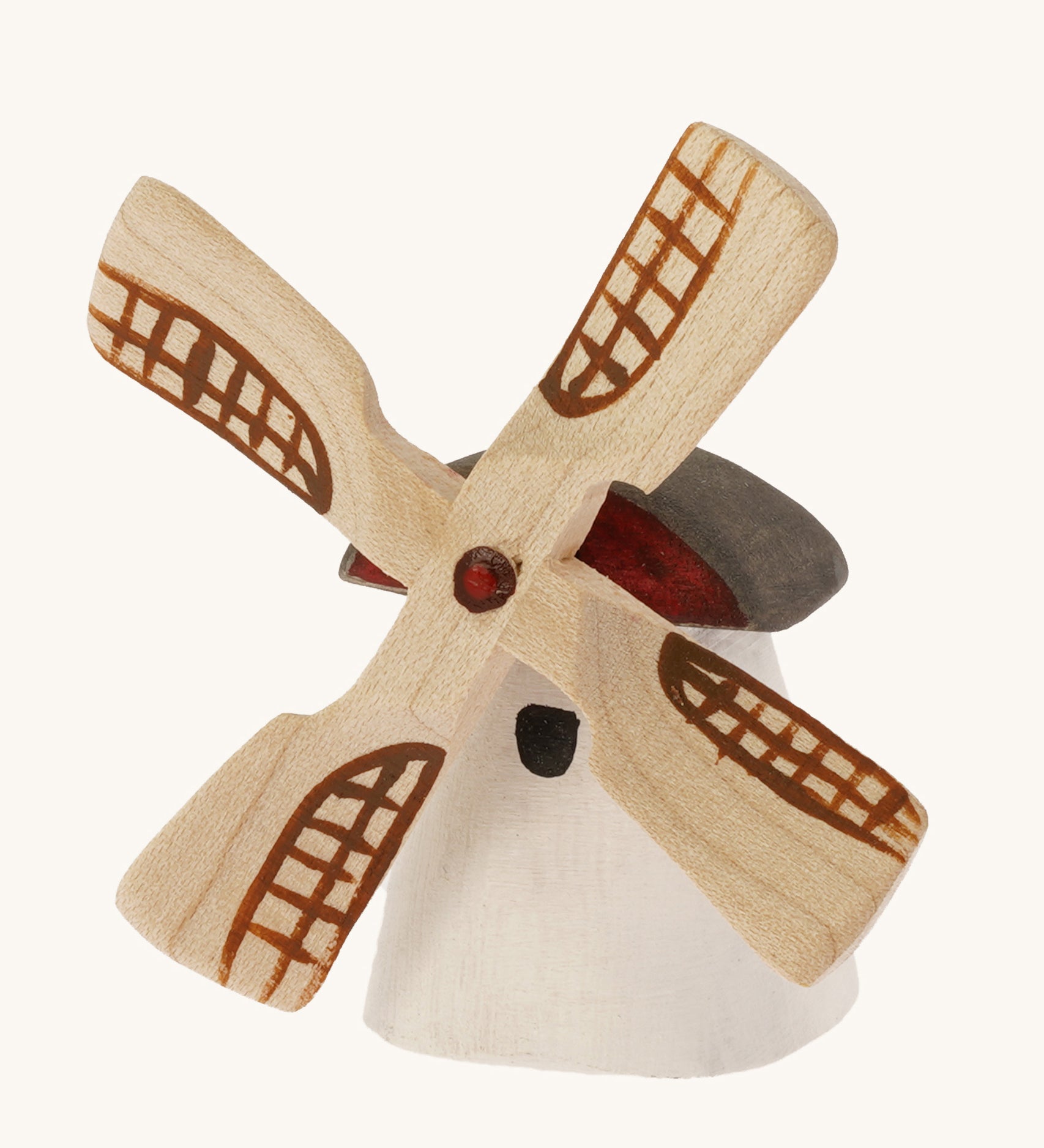 Bumbu Miniature Wooden Moldova Windmill on a plain background.