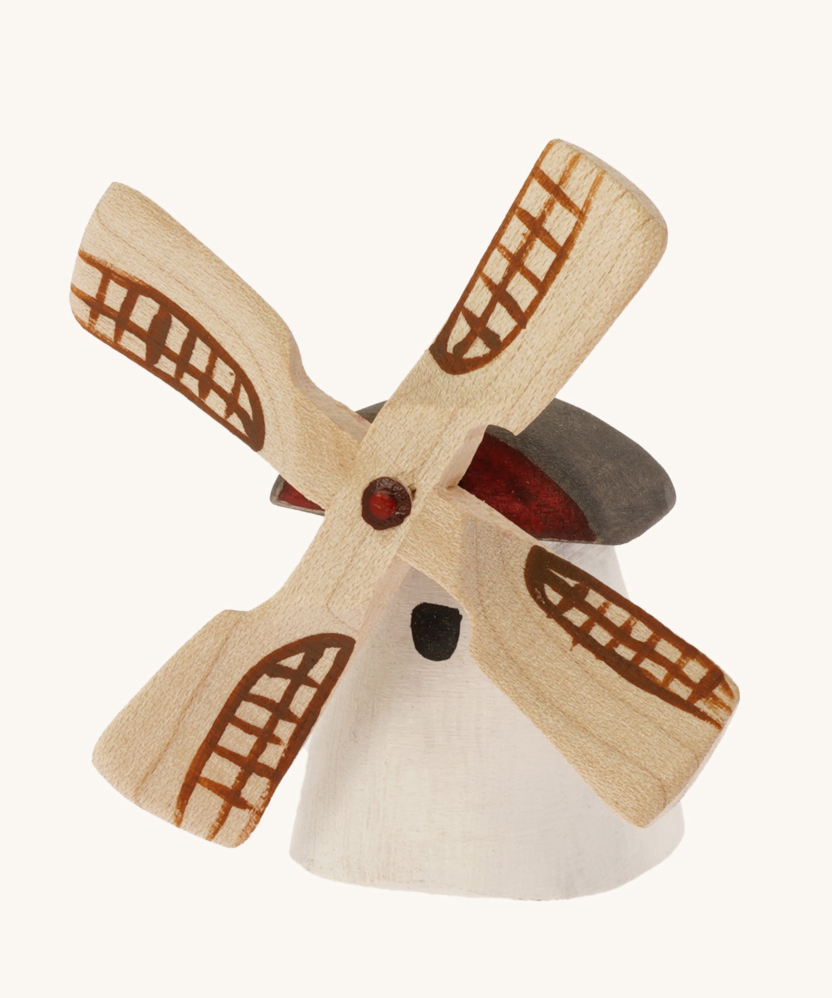 Bumbu Miniature Wooden Moldova Windmill on a plain background.