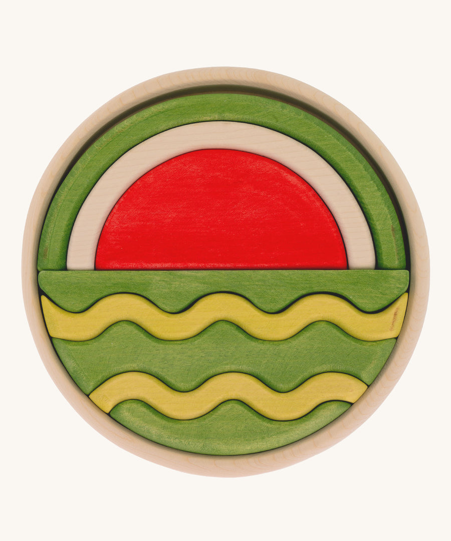 Bumbu Handmade Watermelon Round Wooden Puzzle on a plain background.