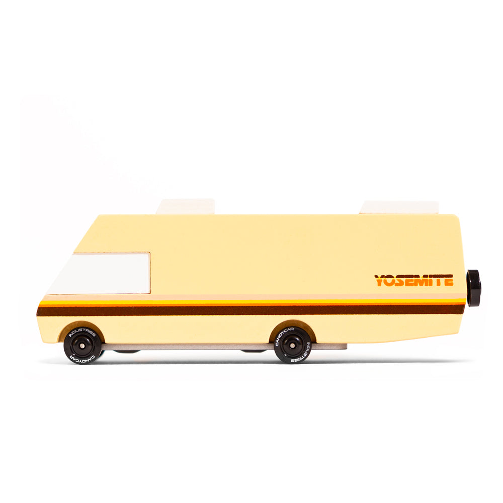 Side of the Candylab childrens wooden yosemite rv campervan toy on a white background