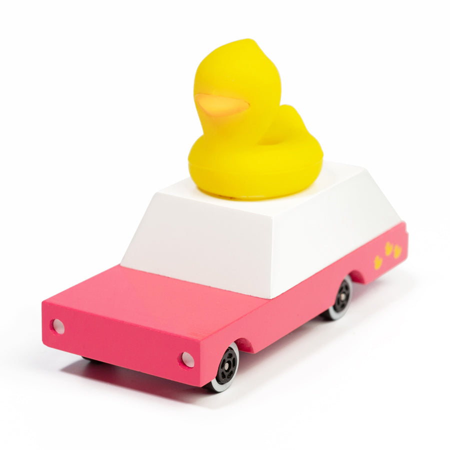 Candylab pink wooden car toy with a rubber duck on its roof