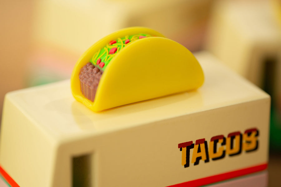 Close up of the miniature taco on top of the Candylab kids handmade wooden taco van toy