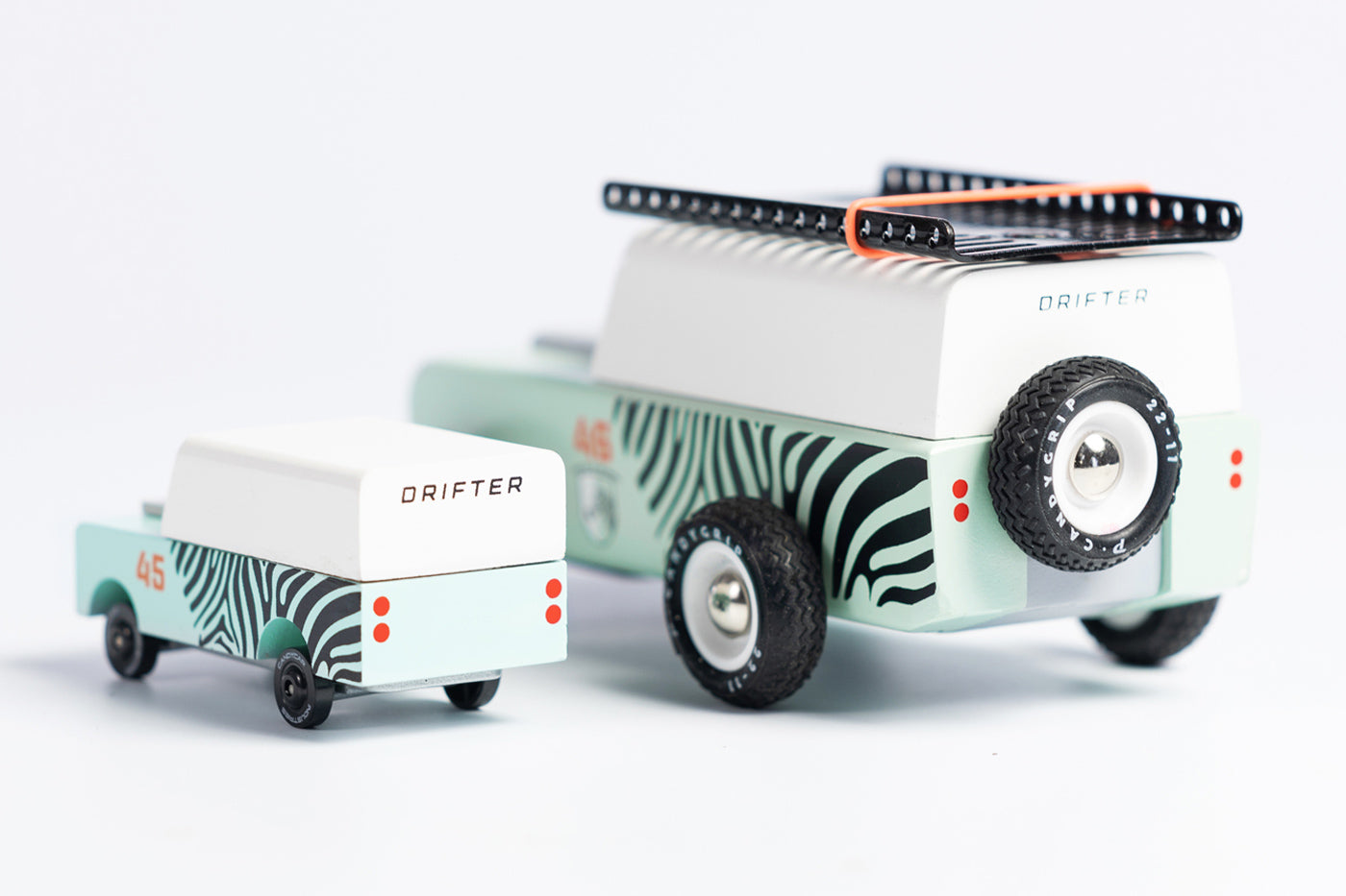 Candylab mini drifter car toy next to a Candylab drifter jeep on a white background