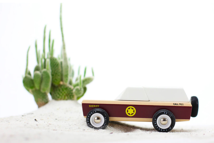 spare wheel on the rear. On a white background