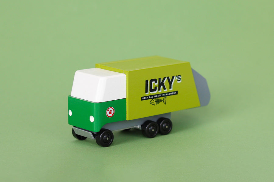 Candylab collectable rubbish lorry toy on a green background