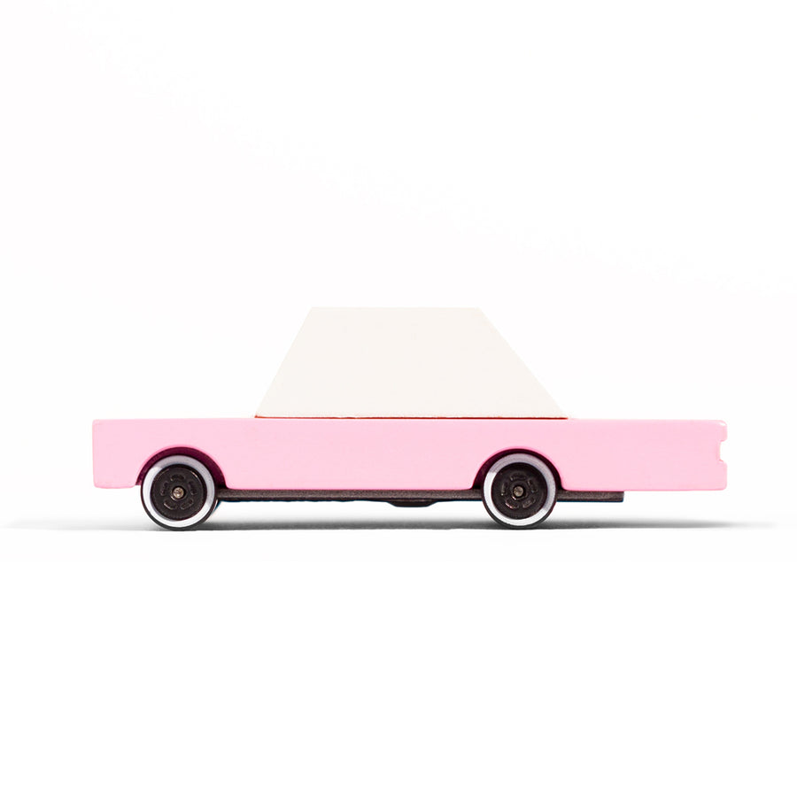 Candylab candycar pink sedan wooden vehicle toy on a white background