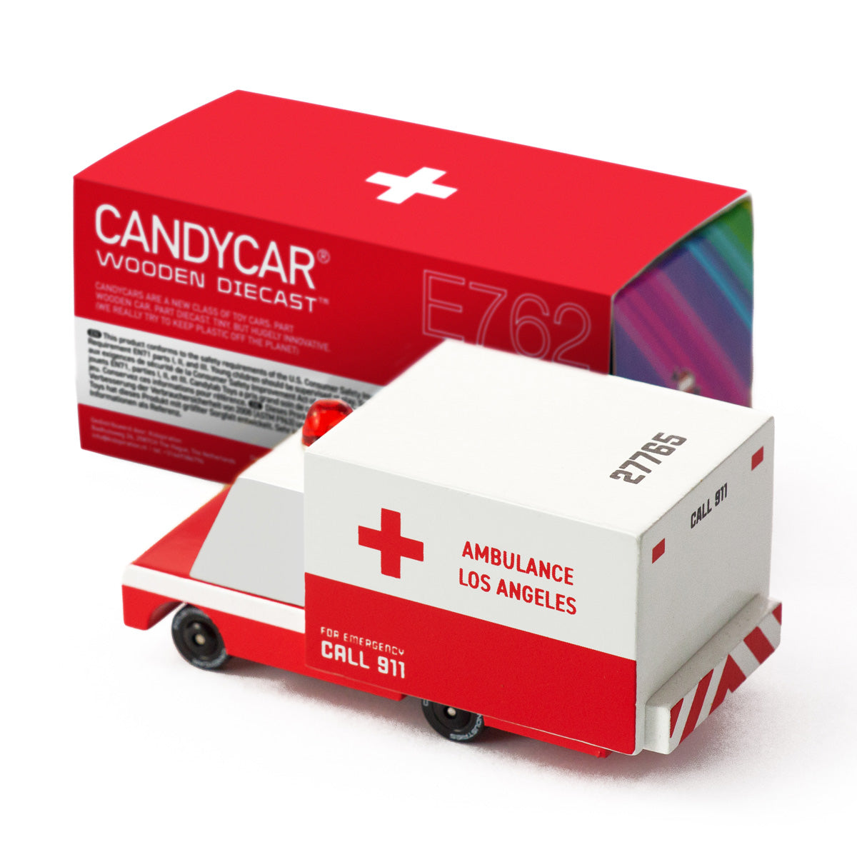 Candylab candycar ambulance van toy on a white background next to its cardboard box