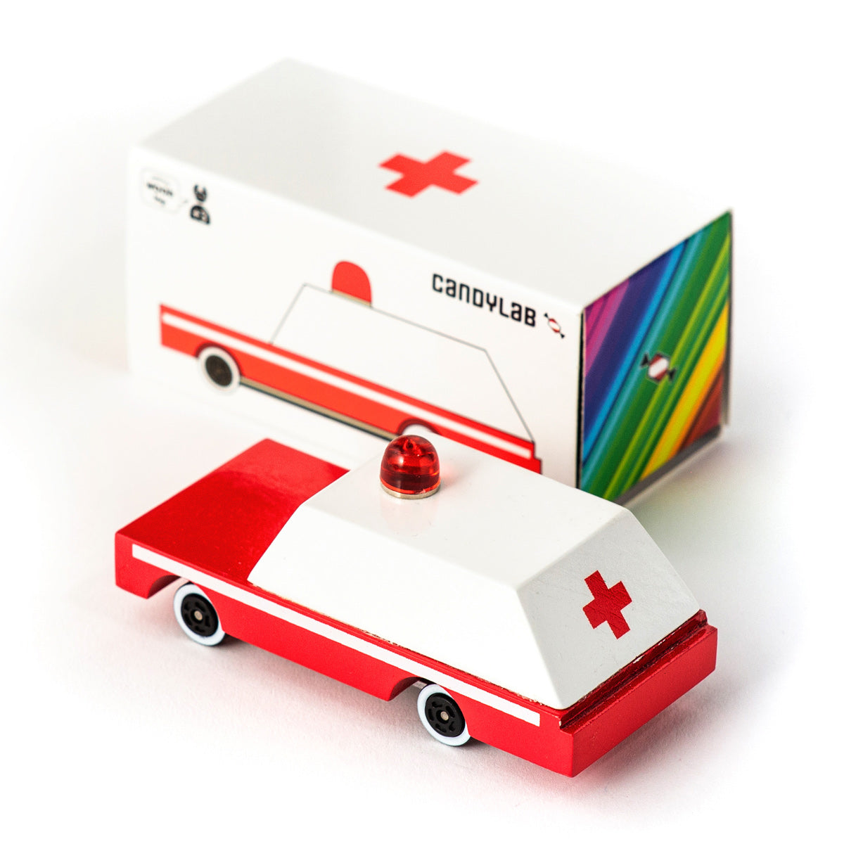 Candylab kids solid wooden candycar ambulance toy on a white background next to its cardboard box