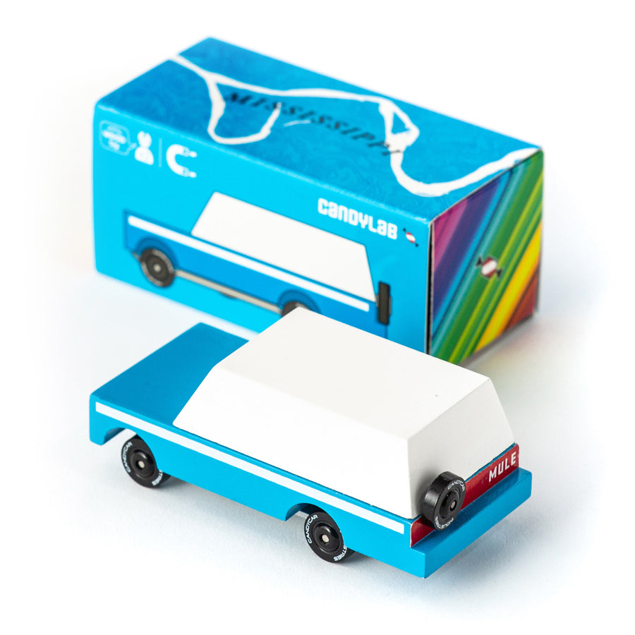 Candylab kids wooden Mississippi mule car toy on a white background next to its blue cardboard box