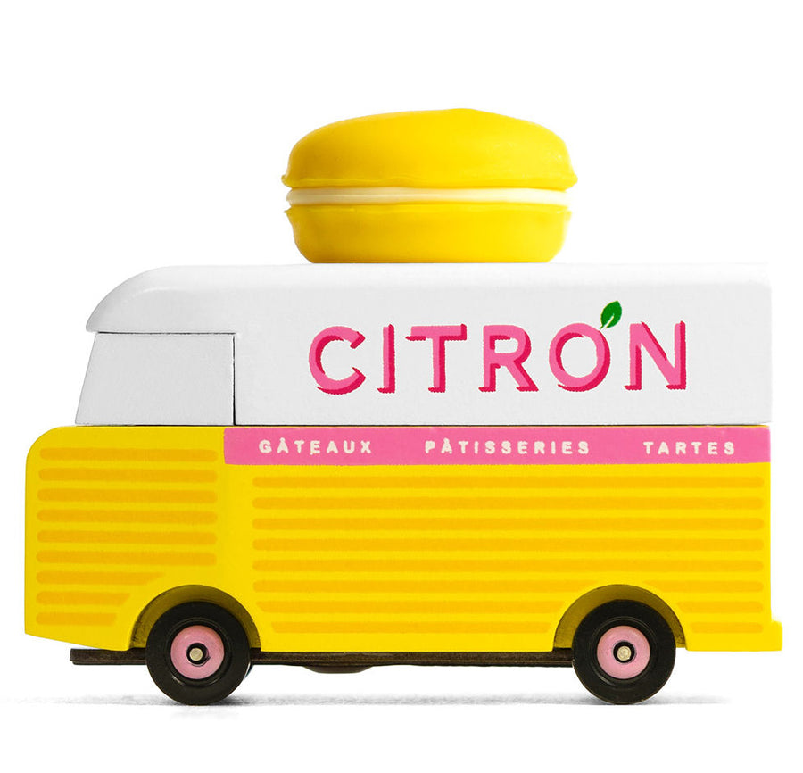 Candylab Yellow toy wooden van with the word citron on the side and a yellow macaron on the top