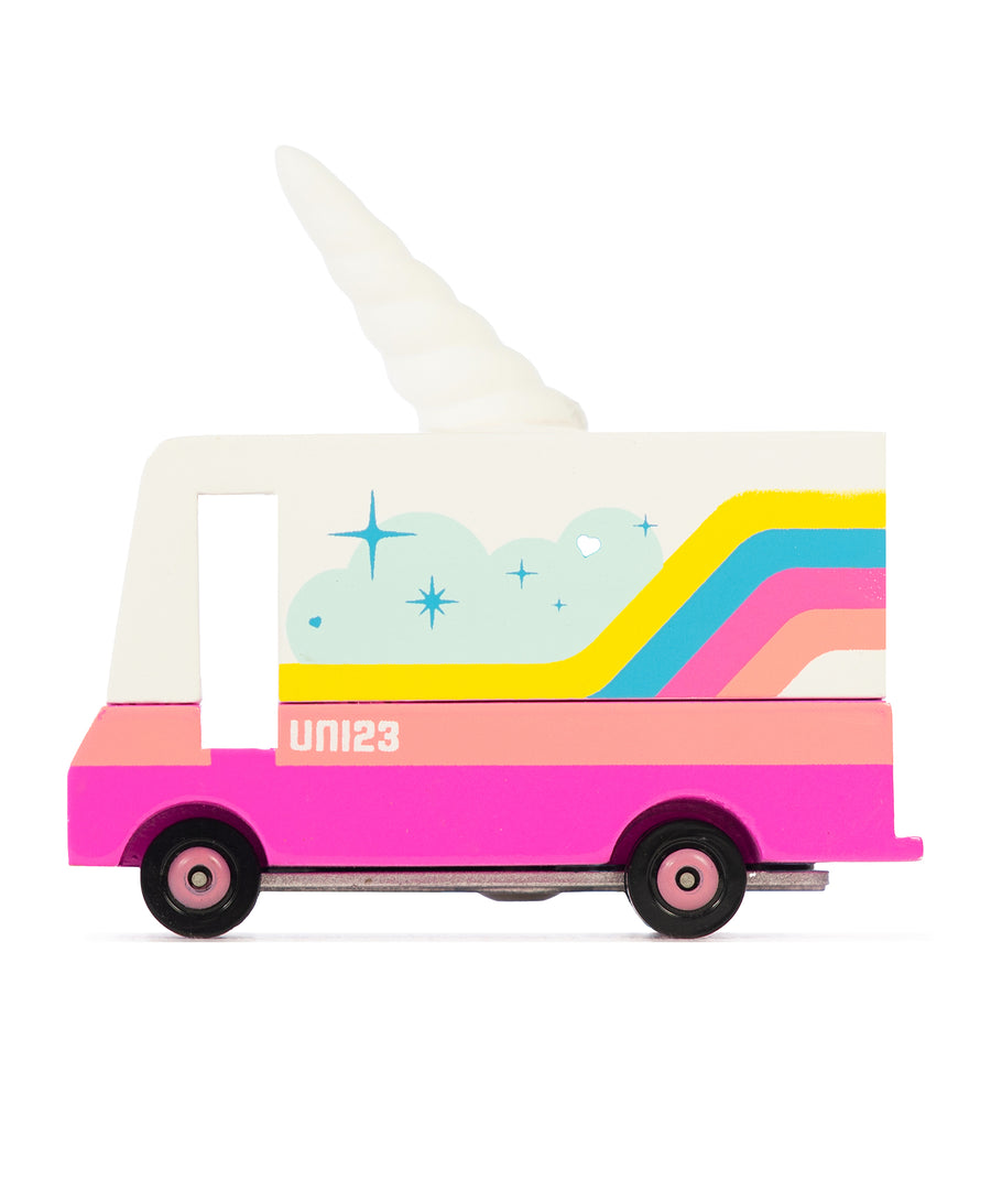 The Candyvan Unicorn 2.0 Van with colourful stripes and a Unicorn horn topper, on a white background