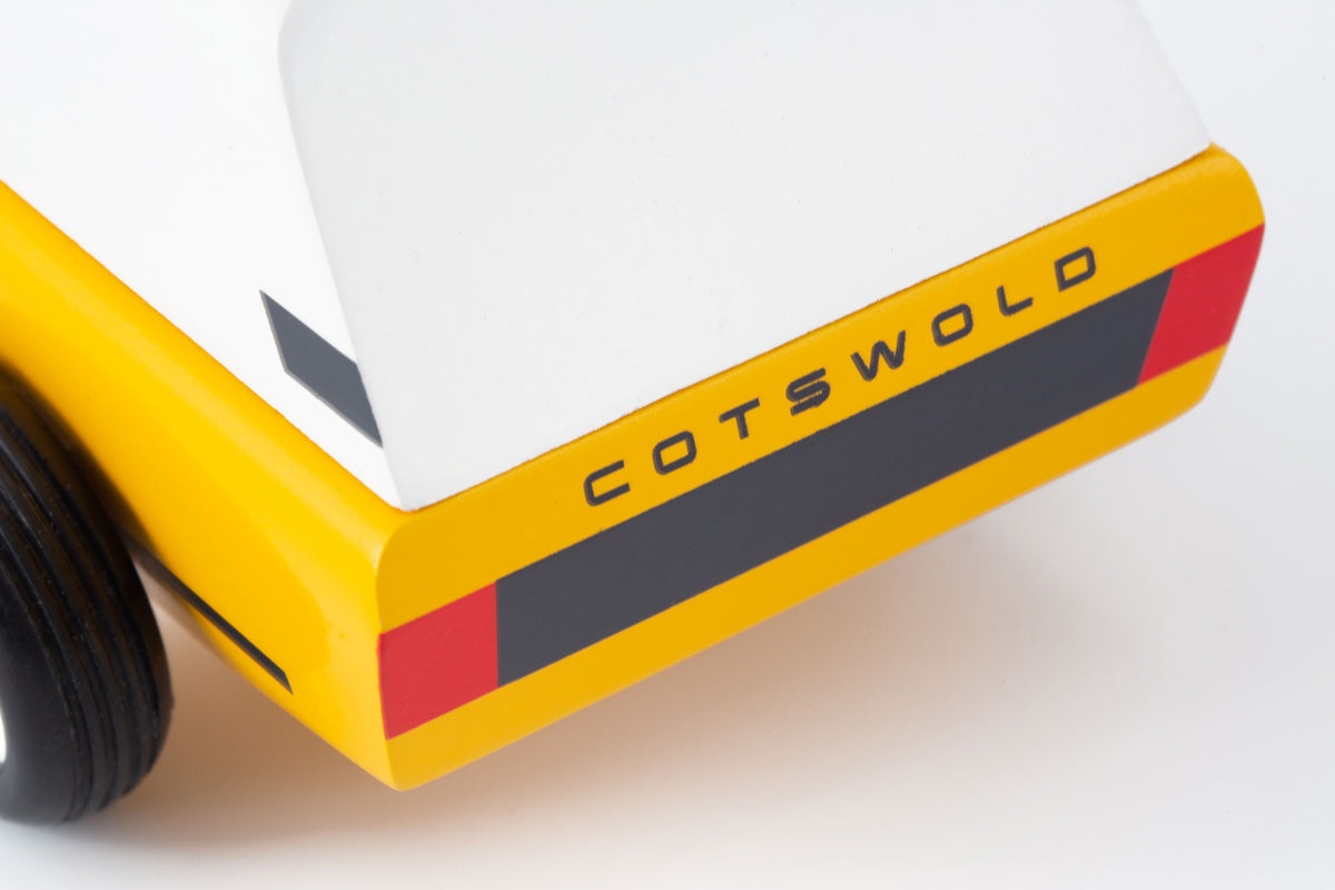 Close up of the Cotswold badge on the back of the Candylab yellow suv toy car