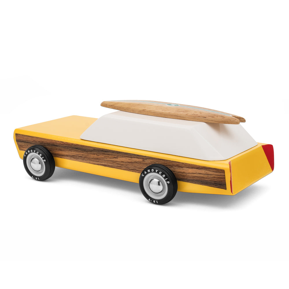 Candylab handmade yellow wooden diecast car on a white background