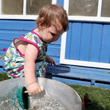 Close popin sloth sleeveless bib modelled by toddler