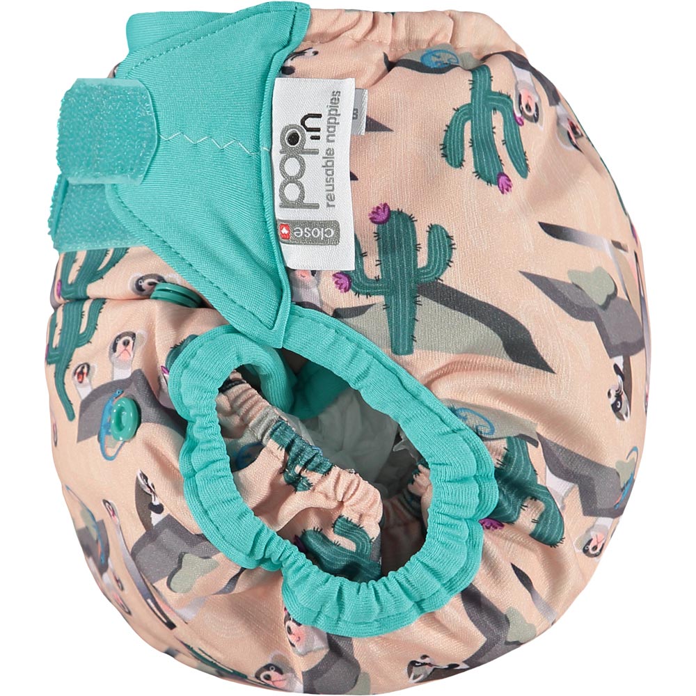 Pop-in light pink Ferret open velcro Nappy all in one nappy with green trim details on a white background