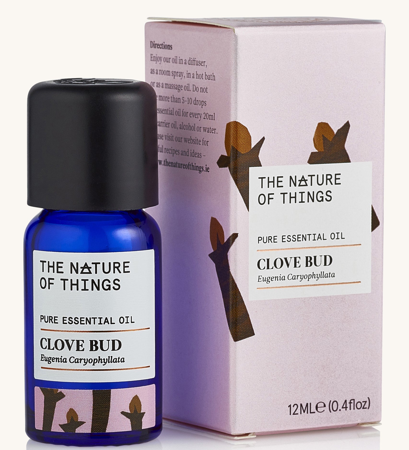 Organic Clove Bud pure essential oil in a blue glass bottle in front of a decorative pink cardboard box.