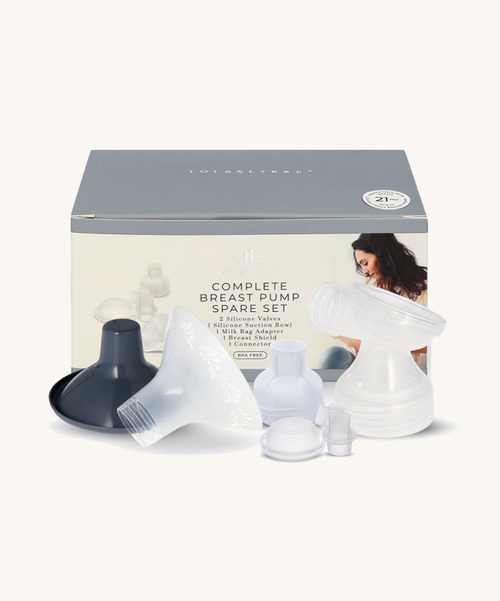 The Lola & Lykke Complete Breast Pump Spare Parts, in front of their box