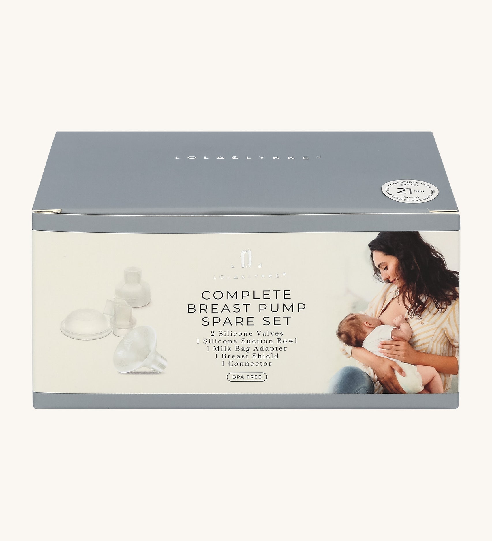 Lola & Lykke Complete Breast Pump Spare Part Box. This includes 2 silicone valves, 1 silicone suction bowl, 1 milk bag adapter, 1 breast shield and 1 connector