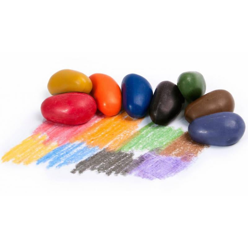 A rainbow of Crayon Rocks colours on white paper