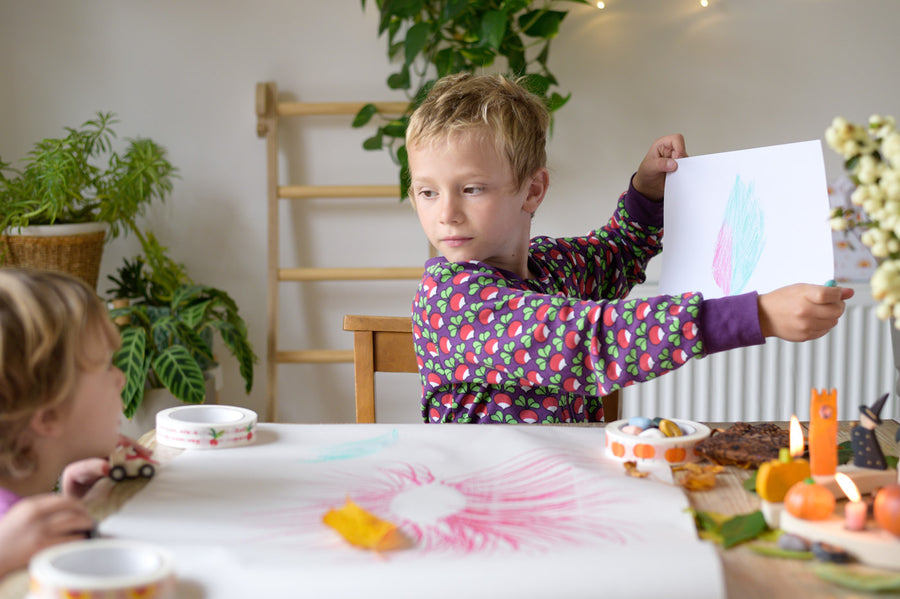 Child sat at a table