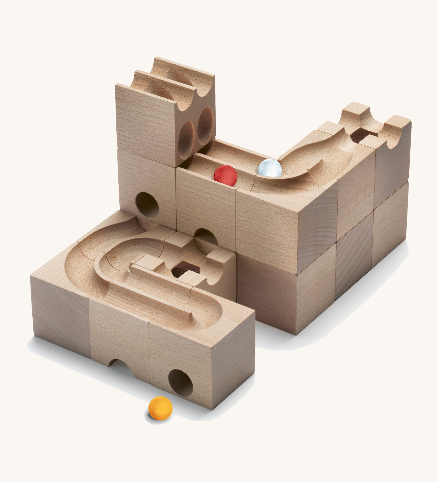 Cuboro kids plastic-free wooden Duo marble run set stacked on a cream background