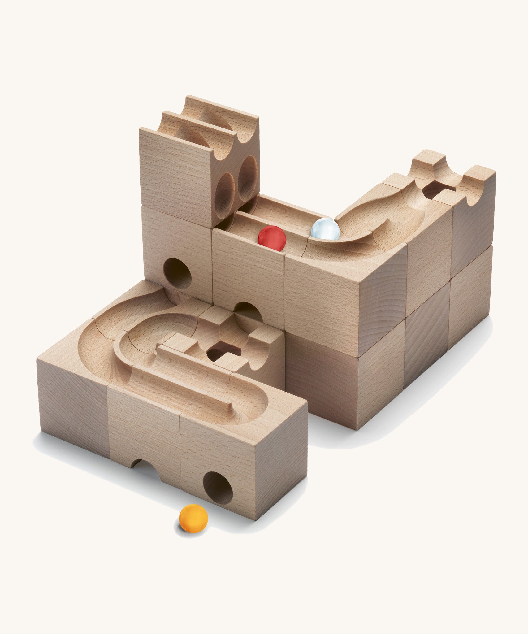 Cuboro kids plastic-free wooden Duo marble run set stacked on a cream background