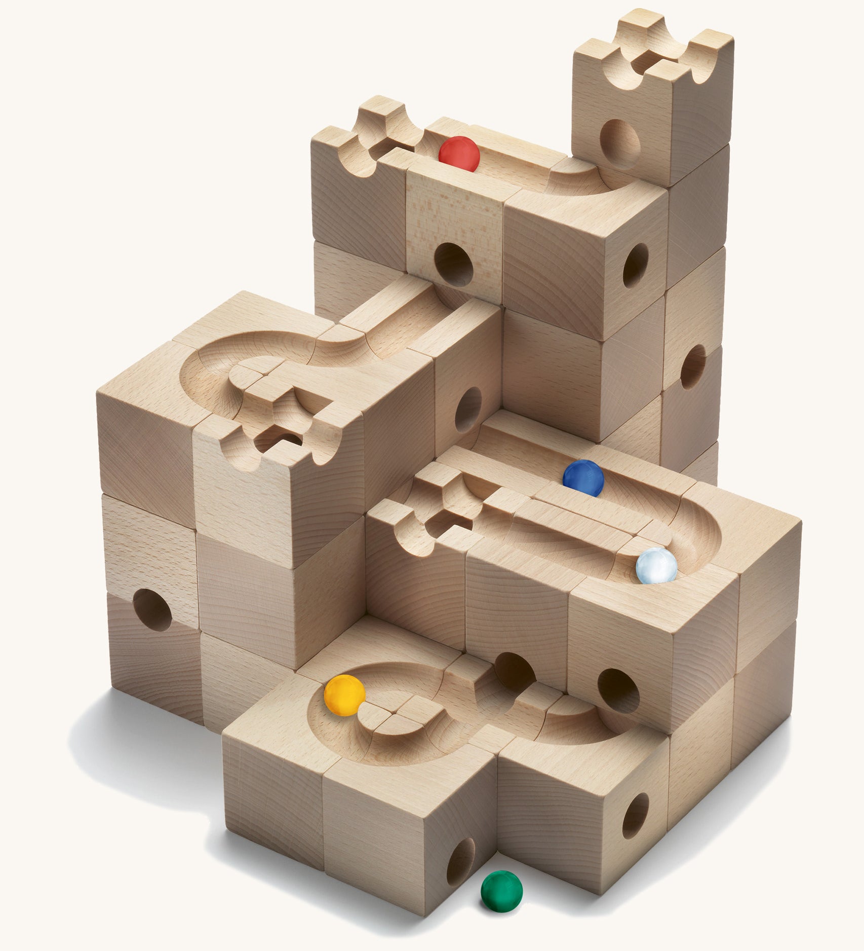 Cuboro kids plastic-free wooden marble run standard toy set stacked up on a white background