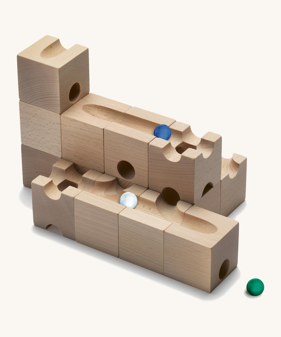 Cuboro Trick Wooden Marble Run Set pictured on a cream background