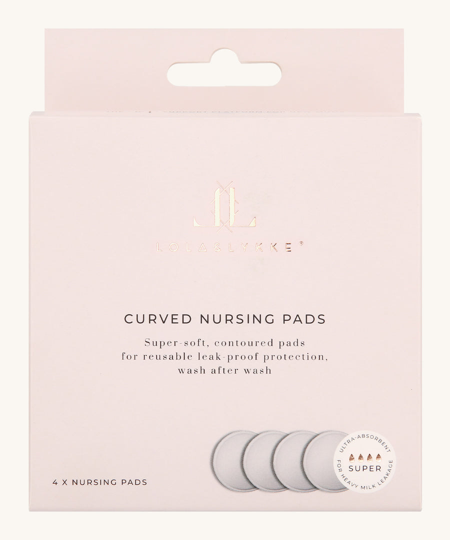 The light pink box of the Lola & Lykke Curved Bamboo Nursing Pads. Includes 4 pads